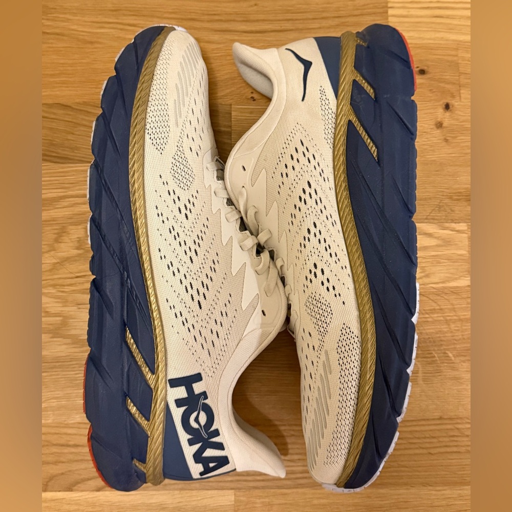 Hoka One Clifton 7 Sneakers in Cream and Navy with Gold Trim